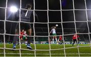27 October 2023; Kyra Carusa of Republic of Ireland heads her side's fourth goal past Albania goalkeeper Viona Rexhepi during the UEFA Women's Nations League B match between Republic of Ireland and Albania at Tallaght Stadium in Dublin. Photo by Stephen McCarthy/Sportsfile