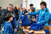 28 October 2023; Spectators receive their merchandise packs before the United Rugby Championship match between Leinster and Hollywoodbets Sharks at the RDS Arena in Dublin. Photo by Sam Barnes/Sportsfile