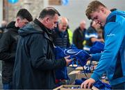 28 October 2023; Supporters receive their merchandise packs before the United Rugby Championship match between Leinster and Hollywoodbets Sharks at the RDS Arena in Dublin. Photo by Sam Barnes/Sportsfile