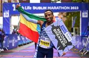 29 October 2023; Kemal Husen celebrates after winning the men's event during the 2023 Irish Life Dublin Marathon. Thousands of runners took to the Fitzwilliam Square start line, to participate in the 42nd running of the Dublin Marathon. Photo by Sam Barnes/Sportsfile