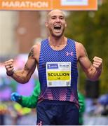 29 October 2023; Stephen Scullion celebrates as he finishes third in the men's event during the 2023 Irish Life Dublin Marathon. Thousands of runners took to the Fitzwilliam Square start line, to participate in the 42nd running of the Dublin Marathon. Photo by Sam Barnes/Sportsfile