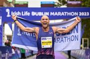 29 October 2023; Irish National Champion Stephen Scullion celebrates after the 2023 Irish Life Dublin Marathon. Thousands of runners took to the Fitzwilliam Square start line, to participate in the 42nd running of the Dublin Marathon. Photo by Sam Barnes/Sportsfile