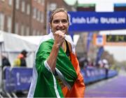 29 October 2023; Irish Women's Champion Ann-Marie McGlynn celebrates after the 2023 Irish Life Dublin Marathon. Thousands of runners took to the Fitzwilliam Square start line, to participate in the 42nd running of the Dublin Marathon. Photo by Sam Barnes/Sportsfile