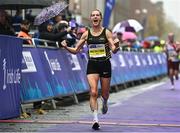 29 October 2023; Irish Women's National Champion Ann-Marie McGlynn celebrates as she crosses the finish line during the 2023 Irish Life Dublin Marathon. Thousands of runners took to the Fitzwilliam Square start line, to participate in the 42nd running of the Dublin Marathon. Photo by Sam Barnes/Sportsfile