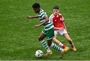 29 October 2023; Evidence Ikevhukwu of Shamrock Rovers in action against Ryan Sheridan of St Patricks Athletic during the EA SPORTS U14 LOI Eddie Wallace Cup match between Shamrock Rovers and St Patrick Athletic at Athlone Town Stadium in Westmeath. Photo by Eóin Noonan/Sportsfile