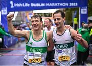 29 October 2023; Terry Keogh and Graham O'Dwyer of Raheny Shamrocks AC, Dublin, after the 2023 Irish Life Dublin Marathon. Thousands of runners took to the Fitzwilliam Square start line, to participate in the 42nd running of the Dublin Marathon. Photo by Sam Barnes/Sportsfile