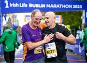 29 October 2023; Michael Quigley from Wexford and Seamus Doherty from Donegal, after the 2023 Irish Life Dublin Marathon. Thousands of runners took to the Fitzwilliam Square start line, to participate in the 42nd running of the Dublin Marathon. Photo by Sam Barnes/Sportsfile