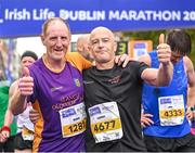 29 October 2023; Michael Quigley from Wexford and Seamus Doherty from Donegal, after the 2023 Irish Life Dublin Marathon. Thousands of runners took to the Fitzwilliam Square start line, to participate in the 42nd running of the Dublin Marathon. Photo by Sam Barnes/Sportsfile