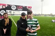 29 October 2023; Tadgh Prizeman of Shamrock Rovers is presented with the player of the match award by Republic of Ireland under 15 head coach Jason Donohue during the EA SPORTS U14 LOI Eddie Wallace Cup match between Shamrock Rovers and St Patrick Athletic at Athlone Town Stadium in Westmeath. Photo by Eóin Noonan/Sportsfile