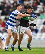 29 October 2023; Mark Cronin of Nemo Rangers is tackled by Mark Collins of Castlehaven during the Cork County Premier Senior Club Football Championship final match between Castlehaven and Nemo Rangers at Páirc Uí Chaoimh in Cork. Photo by Brendan Moran/Sportsfile