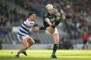 29 October 2023; Luke Connolly of Nemo Rangers kick passes the ball over the head of Ronan Walsh of Castlehaven during the Cork County Premier Senior Club Football Championship final match between Castlehaven and Nemo Rangers at Páirc Uí Chaoimh in Cork. Photo by Brendan Moran/Sportsfile