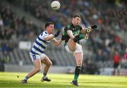 29 October 2023; Luke Connolly of Nemo Rangers kick passes the ball over the head of Ronan Walsh of Castlehaven during the Cork County Premier Senior Club Football Championship final match between Castlehaven and Nemo Rangers at Páirc Uí Chaoimh in Cork. Photo by Brendan Moran/Sportsfile