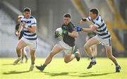 29 October 2023; Mark Cronin of Nemo Rangers in action against Rory Maguire, left, and Johnny O'Regan of Castlehaven during the Cork County Premier Senior Club Football Championship final match between Castlehaven and Nemo Rangers at Páirc Uí Chaoimh in Cork. Photo by Brendan Moran/Sportsfile