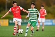 29 October 2023; Harry Murray of Shamrock Rovers in action against Billy Hayes of St Patricks Athletic during the EA SPORTS U15 LOI Michael Hayes Cup match between St Patrick Athletic and Shamrock Rovers at Athlone Town Stadium in Westmeath. Photo by Eóin Noonan/Sportsfile