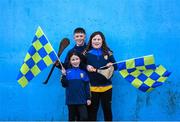 29 October 2023; Na Fianna supporters, from left, Orla, age seven, Senan, age eleven, and Laoise Burke, age nine, before the Dublin County Senior Club Hurling Championship final match between Ballyboden St Endas and Na Fianna at Parnell Park in Dublin. Photo by Stephen Marken/Sportsfile