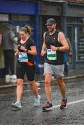 29 October 2023; Ciara Daly and Mark Thomas from Dublin during the 2023 Irish Life Dublin Marathon. Thousands of runners took to the Fitzwilliam Square start line, to participate in the 42nd running of the Dublin Marathon. Photo by Ray McManus/Sportsfile