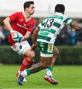 29 October 2023; Joey Carbery of Munster passes the ball during the United Rugby Championship match between Benetton and Munster at Stadio Monigo in Treviso, Italy. Photo by Massimiliano Carnabuci/Sportsfile