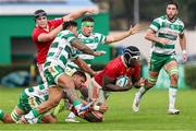 29 October 2023; Edwin Edogbo of Munster is tackled by Malakai Fekitoa of Benetton during the United Rugby Championship match between Benetton and Munster at Stadio Monigo in Treviso, Italy. Photo by Massimiliano Carnabuci/Sportsfile