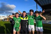 29 October 2023; Garda Inspector Paul Donoghue with  O'Loughlin Gaels from left Sean Bolger, Paddy Butler and Sammy Johnston after the Kilkenny County Senior Club Hurling Championship final match between Shamrocks Ballyhale and O'Loughlin Gaels at UPMC Nowlan Park in Kilkenny. Photo by Matt Browne/Sportsfile