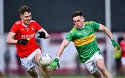 29 October 2023; Eunan Mulholland of Glen in action against Conall Herron of O'Donovan Rossa during the Derry County Senior Club Football Championship final match between Glen and O'Donovan Rossa at Celtic Park in Derry. Photo by Ben McShane/Sportsfile