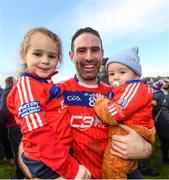 29 October 2023; James Regan of St Thomas celebrate’s with his children Mollie and Sean at the end of the game in the Galway County Senior Club Hurling Championship final match between Turloughmore and St Thomas at Pearse Stadium in Galway. Photo by Ray Ryan/Sportsfile cousins