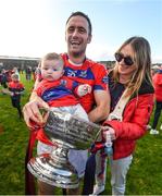 29 October 2023; David Burke of St Thomas celebrates with his child Robyn and wife Laura after the Galway County Senior Club Hurling Championship final match between Turloughmore and St Thomas at Pearse Stadium in Galway. Photo by Ray Ryan/Sportsfile