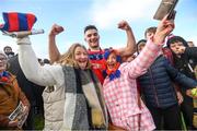 29 October 2023; John Headd of St Thomas celebrates with his mother Breda and his aunt Geraldine Duggan after the Galway County Senior Club Hurling Championship final match between Turloughmore and St Thomas at Pearse Stadium in Galway. Photo by Ray Ryan/Sportsfile cousins