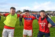 29 October 2023; Evan Duggan and Victor Manso of St Thomas celebrate with manager Kenneth Burke after the Galway County Senior Club Hurling Championship final match between Turloughmore and St Thomas at Pearse Stadium in Galway. Photo by Ray Ryan/Sportsfile