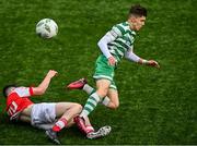 29 October 2023; Maxim Kovalevskis of Shamrock Rovers is tackled by Jamie Fitzpatrick of St Patricks Athletic during the EA SPORTS U15 LOI Michael Hayes Cup match between St Patrick Athletic and Shamrock Rovers at Athlone Town Stadium in Westmeath. Photo by Eóin Noonan/Sportsfile