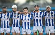 29 October 2023; Ballyboden St Endas players stand for a moment silence in honour of the late Billie Grogan, wife of Jerry Grogan before the Dublin County Senior Club Hurling Championship final match between Ballyboden St Endas and Na Fianna at Parnell Park in Dublin. Photo by Stephen Marken/Sportsfile
