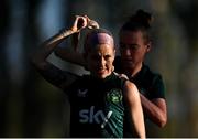 29 October 2023; Denise O'Sullivan has her GPS unit fitted by Claire O'Riordan during a Republic of Ireland women training session at Shkodra Football Club in Shkoder, Albania. Photo by Stephen McCarthy/Sportsfile