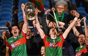 29 October 2023; Ballina Stephenites joint-captains Mike Murray, left, and Dylan Thornton lift the Paddy Moclair Cup after their side's victory in the Mayo County Senior Club Football Championship final match between Ballina Stephenites and Breaffy at Hastings Insurance MacHale Park in Castlebar, Mayo. Photo by Piaras Ó Mídheach/Sportsfile