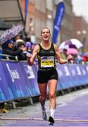 29 October 2023; Women's National Champion Ann-Marie McGlynn celebrates after the 2023 Irish Life Dublin Marathon. Thousands of runners took to the Fitzwilliam Square start line, to participate in the 42nd running of the Dublin Marathon. Photo by Sam Barnes/Sportsfile