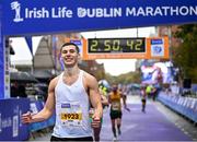 29 October 2023; Michael Boland from Dublin 15,  celebrates finishing the 2023 Irish Life Dublin Marathon. Thousands of runners took to the Fitzwilliam Square start line, to participate in the 42nd running of the Dublin Marathon. Photo by Sam Barnes/Sportsfile