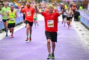 29 October 2023; James Butchart from Kildare, celebrates finishing the 2023 Irish Life Dublin Marathon. Thousands of runners took to the Fitzwilliam Square start line, to participate in the 42nd running of the Dublin Marathon. Photo by Sam Barnes/Sportsfile