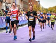 29 October 2023; Eoin O' Brien from Dublin, left, and JP Gilmartin from Galway, running in the 2023 Irish Life Dublin Marathon. Thousands of runners took to the Fitzwilliam Square start line, to participate in the 42nd running of the Dublin Marathon. Photo by Sam Barnes/Sportsfile