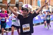 29 October 2023; Andrea Guadalupi celebrates finishing the 2023 Irish Life Dublin Marathon. Thousands of runners took to the Fitzwilliam Square start line, to participate in the 42nd running of the Dublin Marathon. Photo by Sam Barnes/Sportsfile
