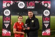 29 October 2023; Aoife Sheridan of Shelbourne is presented with the player of the match award by Republic od Ireland women's under 17 manager James Scott after the EA SPORTS U17 Women's Cup final match between Shelbourne and Athlone Town at Athlone Town Stadium in Westmeath. Photo by Eóin Noonan/Sportsfile