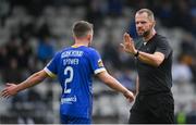 28 October 2023; Referee Gavin Colfer talks to Darragh Power of Waterford during the SSE Airtricity Men's First Division Play-Off semi-final second leg match between Waterford and Athlone Town at the RSC in Waterford. Photo by Seb Daly/Sportsfile
