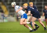 29 October 2023; Michael Purcell of Thurles Sarsfields is tackled by Eoghan Sharkey of Kiladangan during the Tipperary County Senior Club Hurling Championship final replay match between Kiladangan and Thurles Sarsfields at FBD Semple Stadium in Thurles, Tipperary. Photo by Tom Beary/Sportsfile