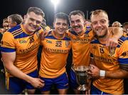 29 October 2023; Na Fianna players, from left, Jack Burke, Matthew Oliver, Sean Baxter, and Gavin King after their side's victory in the Dublin County Senior Club Hurling Championship final match between Ballyboden St Endas and Na Fianna at Parnell Park in Dublin. Photo by Stephen Marken/Sportsfile
