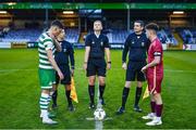 30 October 2023; Referee Daniel Murphy performs the coin-toss with team captains Carl Lennox of Shamrock Rovers, left, and Liam Murray of Galway United before the EA SPORTS MU19 LOI Enda McGuill Cup match between Galway United and Shamrock Rovers at Eamonn Deacy Park in Galway. Photo by Ben McShane/Sportsfile