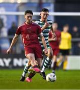 30 October 2023; Steven Healy of Galway United in action against Daniel Burgin of Shamrock Rovers during the EA SPORTS MU19 LOI Enda McGuill Cup match between Galway United and Shamrock Rovers at Eamonn Deacy Park in Galway. Photo by Ben McShane/Sportsfile