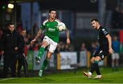 30 October 2023; Ruairi Keating of Cork City in action against Aaron Greene of Shamrock Rovers during the SSE Airtricity Premier Division match between Cork City and Shamrock Rovers at Turner's Cross in Cork. Photo by David Fitzgerald/Sportsfile
