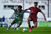 30 October 2023; Gideon Tetteh of Shamrock Rovers in action against Steven Healy of Galway United during the EA SPORTS MU19 LOI Enda McGuill Cup match between Galway United and Shamrock Rovers at Eamonn Deacy Park in Galway. Photo by Ben McShane/Sportsfile