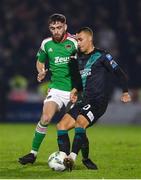 30 October 2023; Graham Burke of Shamrock Rovers in action against Conor Drinan of Cork City during the SSE Airtricity Premier Division match between Cork City and Shamrock Rovers at Turner's Cross in Cork. Photo by John Sheridan/Sportsfile