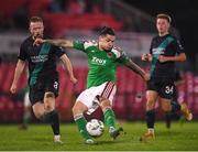 30 October 2023; Ruairi Keating of Cork City in action against Sean Hoare of Shamrock Rovers during the SSE Airtricity Premier Division match between Cork City and Shamrock Rovers at Turner's Cross in Cork. Photo by John Sheridan/Sportsfile