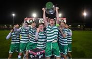 30 October 2023; Shamrock Rovers captain Carl Lennox lifts the Enda McGuill Cup with his teammates after the EA SPORTS MU19 LOI Enda McGuill Cup match between Galway United and Shamrock Rovers at Eamonn Deacy Park in Galway. Photo by Ben McShane/Sportsfile
