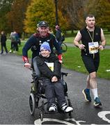 29 October 2023; Nigel McCabe from Dublin 24, and Jonathan Hennessy from Dublin 24 during the 2023 Irish Life Dublin Marathon. Thousands of runners took to the Fitzwilliam Square start line, to participate in the 42nd running of the Dublin Marathon. Photo by Ramsey Cardy/Sportsfile