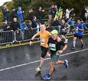 29 October 2023; Fergus Brady from Dublin 6, and Barry Lyons from Kildare, during the 2023 Irish Life Dublin Marathon. Thousands of runners took to the Fitzwilliam Square start line, to participate in the 42nd running of the Dublin Marathon. Photo by Ramsey Cardy/Sportsfile